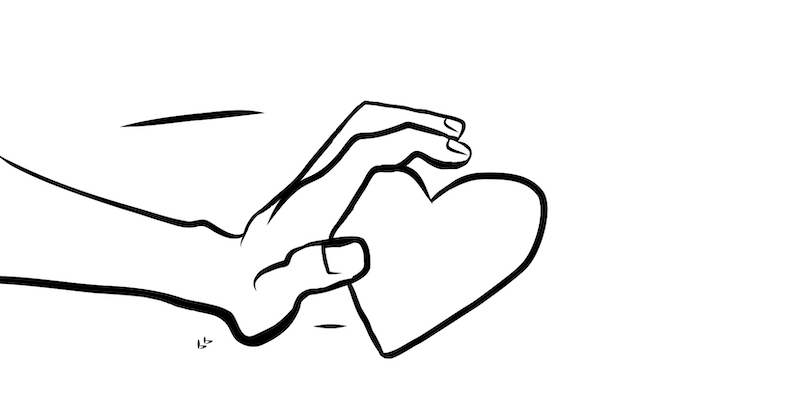 A hand pushing a heart